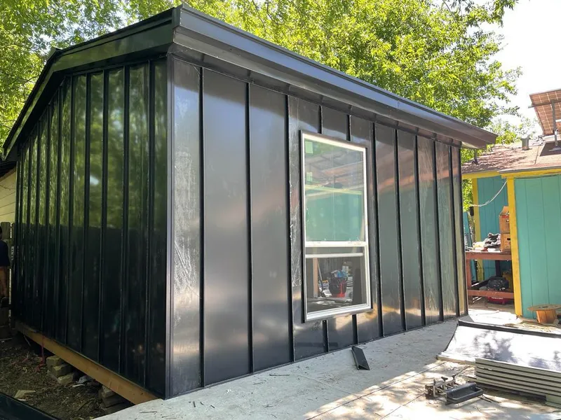 Black standing seam metal wall panels for Metal Roof Installation in Bear